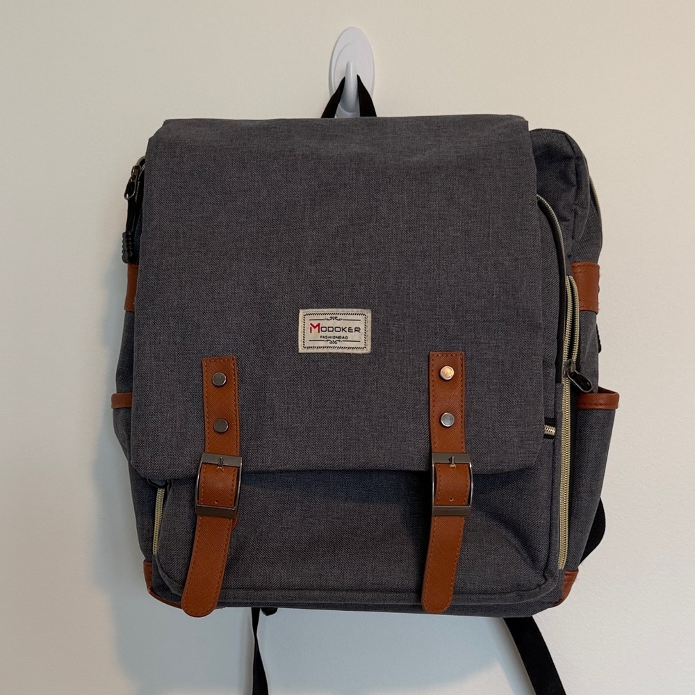 Charcoal Gray Canvas Backpack with Brown Trim